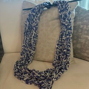 Purple & white infinity scarf.